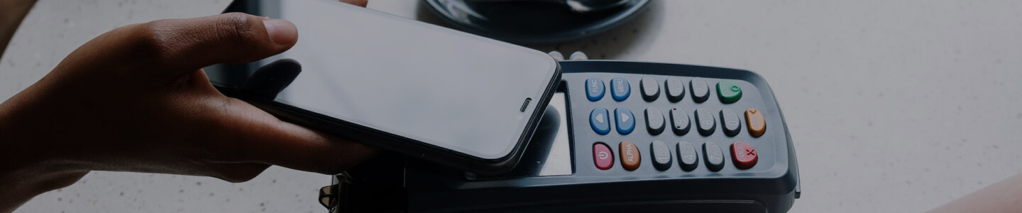 human hand doing payment with thair mobile phone