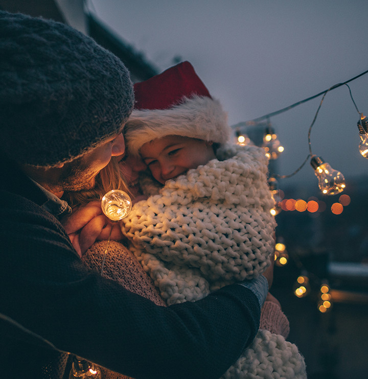 father holding his child