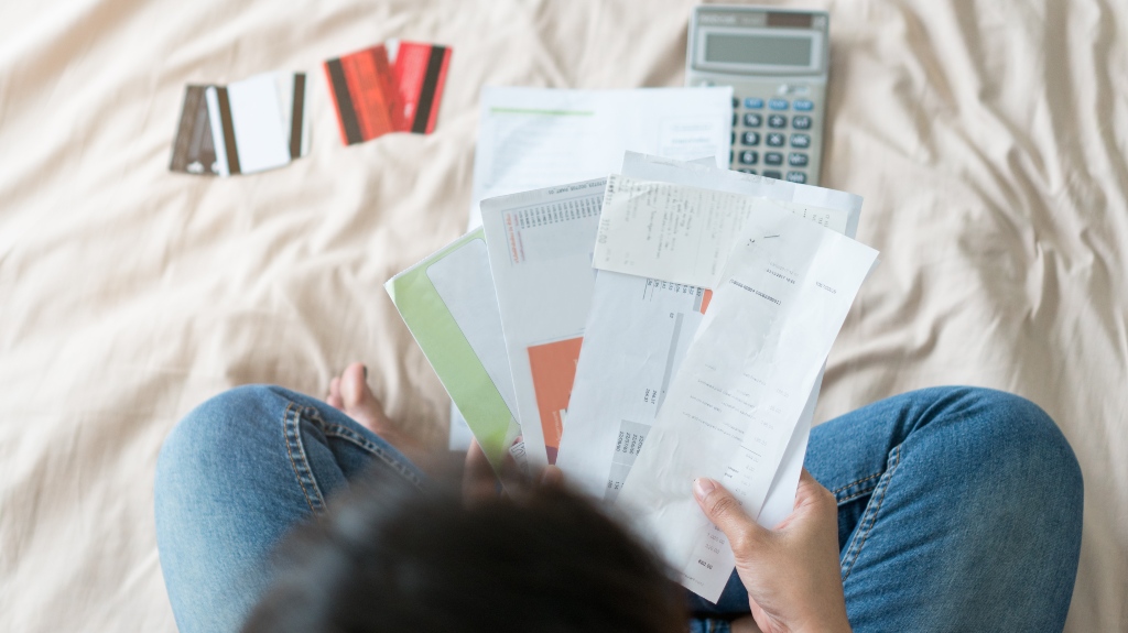 person looking at debt