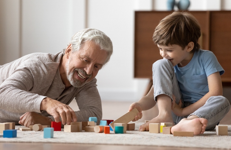 Grandfather plays with his grandson