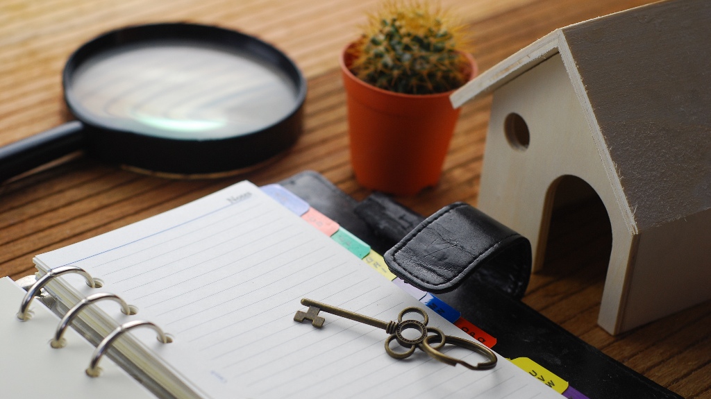Wooden house model and keys
